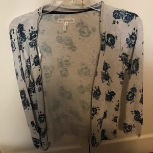 White and blue floral cardigan.